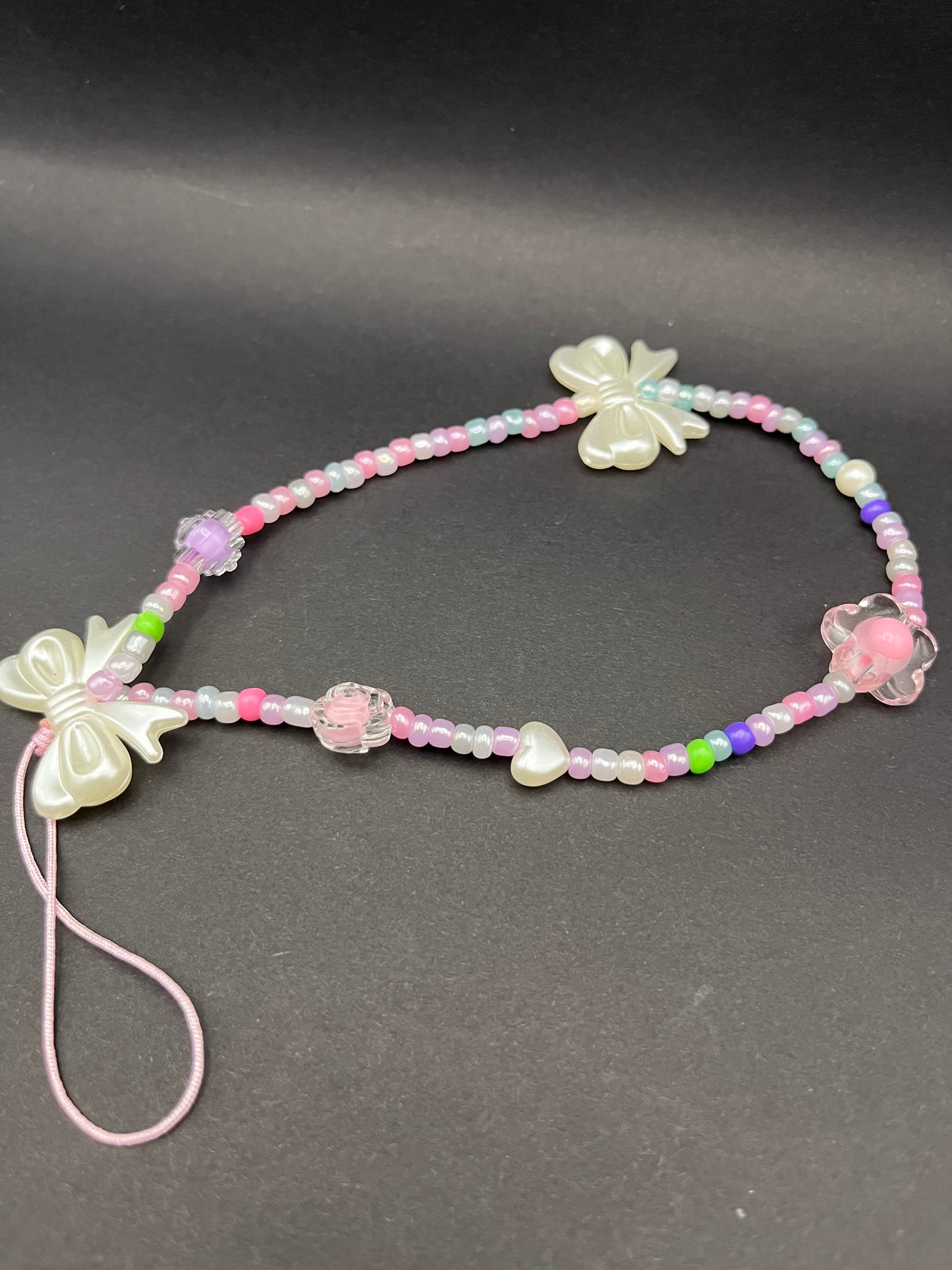 Crystal Bow Lanyard: A Touch of Elegance for Your Essentials!